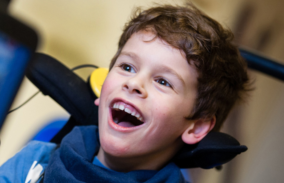 Close up of face of smiling yourng boy